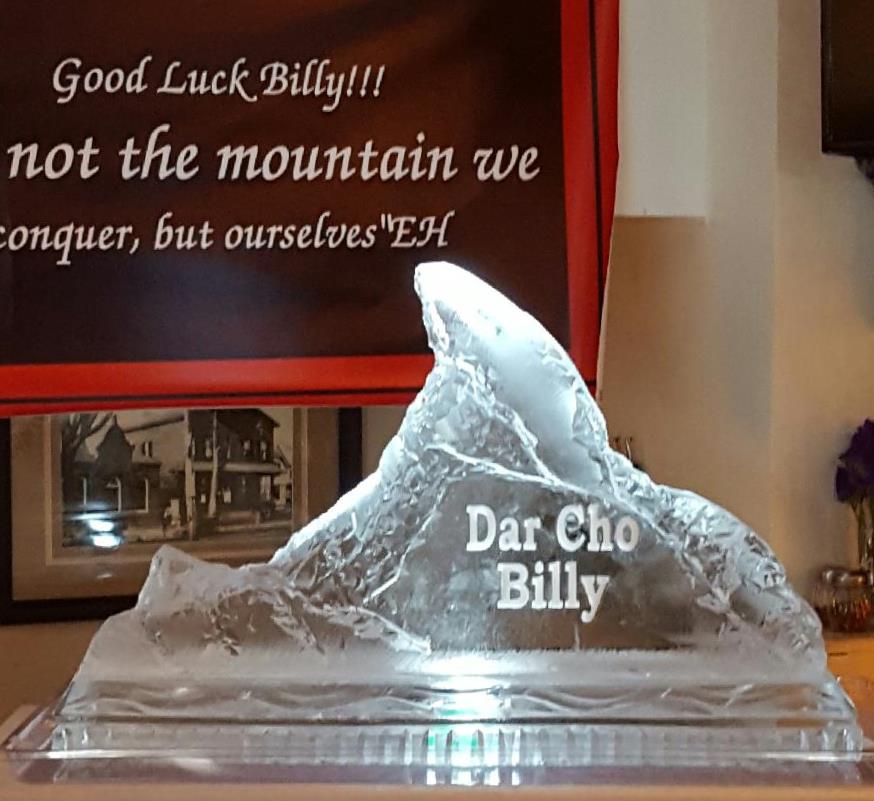 Mountain-themed engraved ice sculpture display