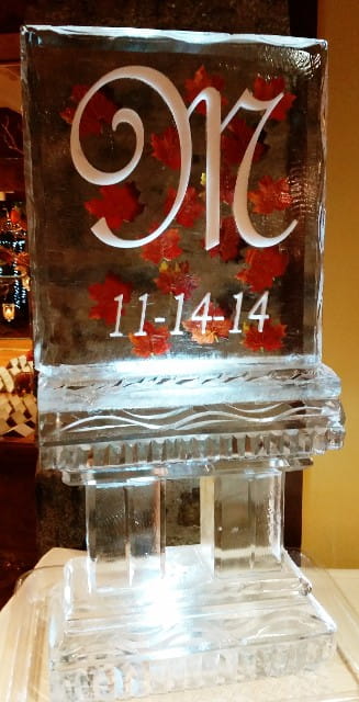 Personalized wedding ice sculpture with initials MC and wedding date