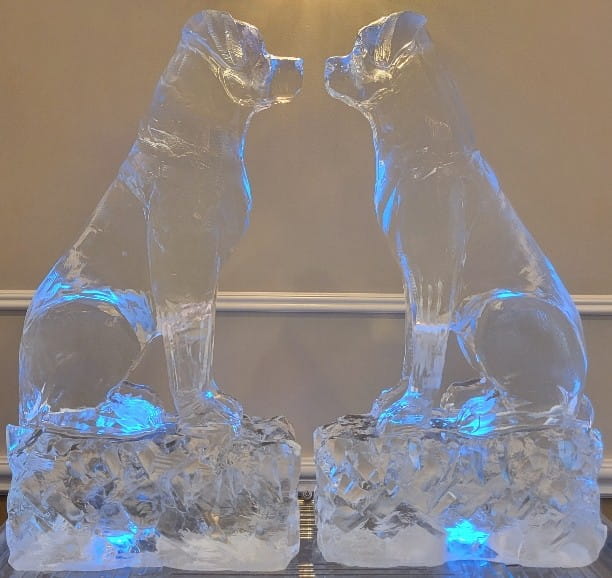 Clinking champagne glasses ice sculpture