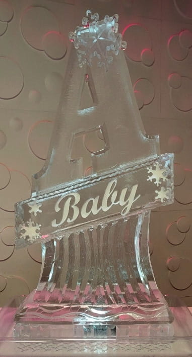 Baby-themed engraved ice sculpture