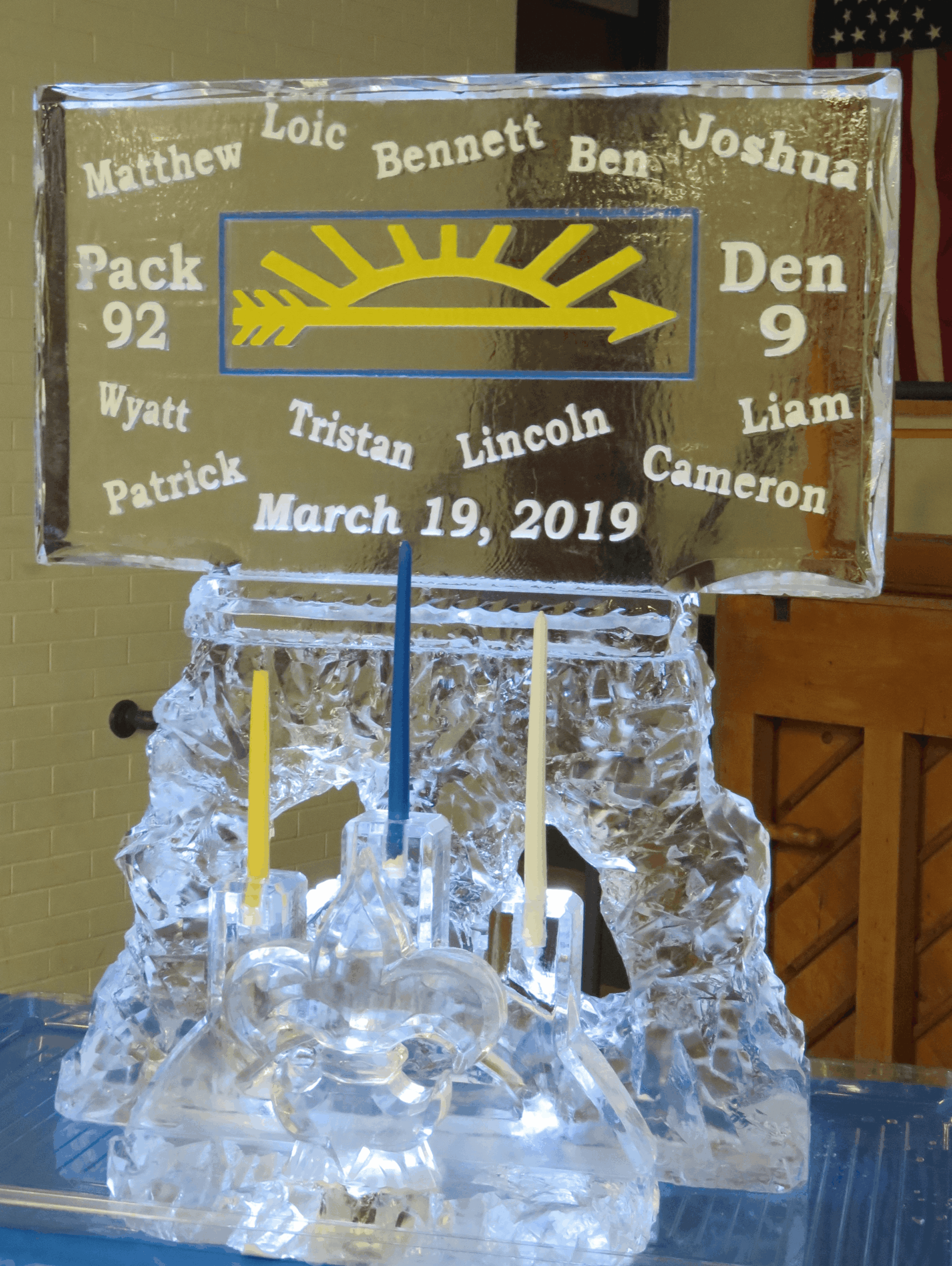 Personalized graduation ice sculpture with signpost design