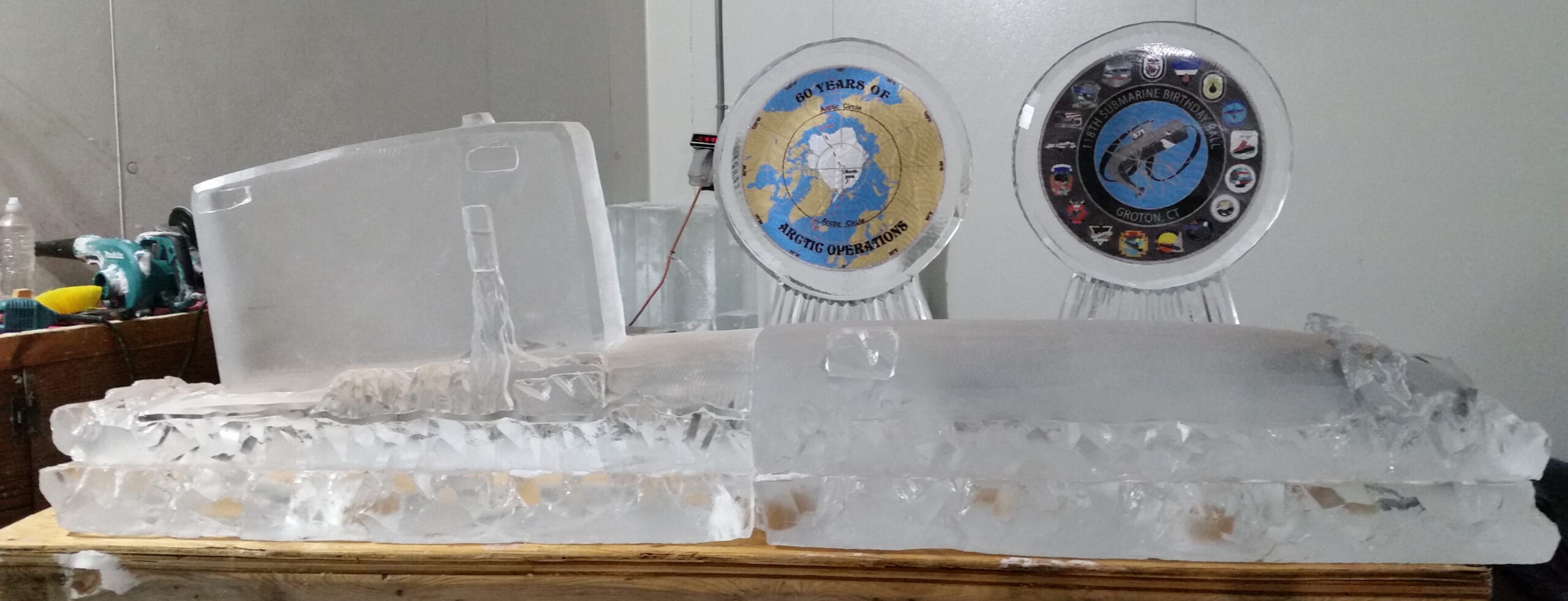 Custom engraved ice sculpture with event logos