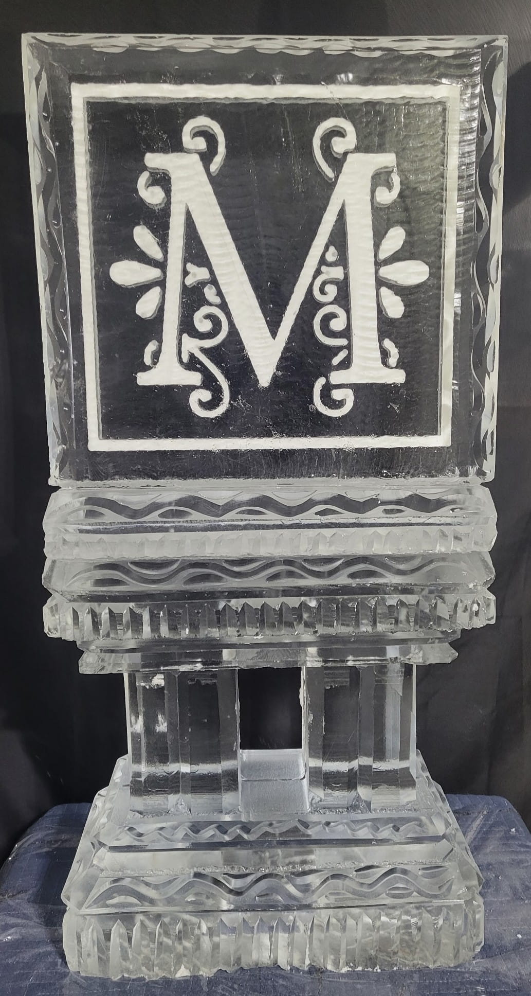 Monogram M engraved square ice sculpture