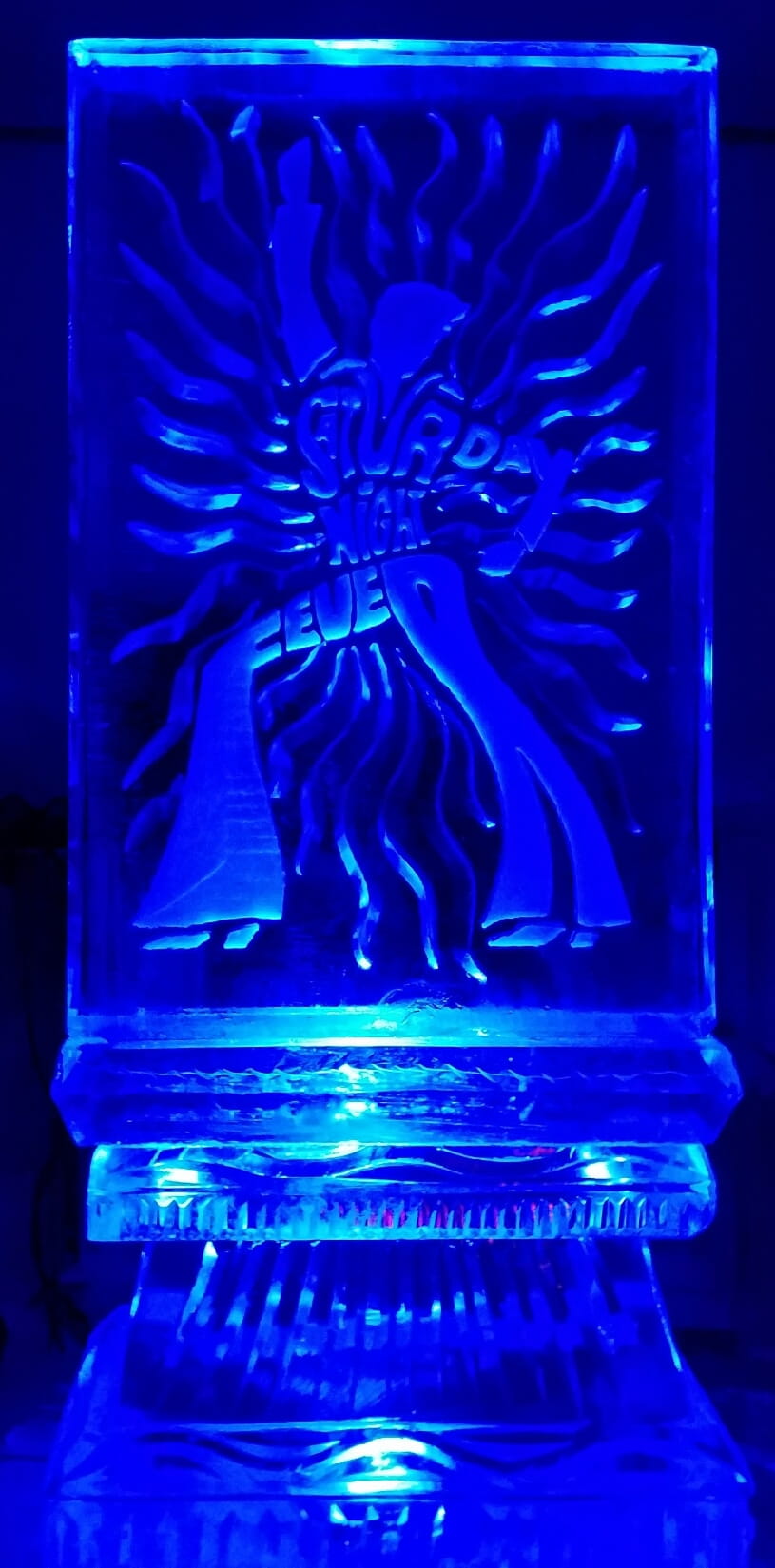 Blue illuminated jellyfish ice sculpture