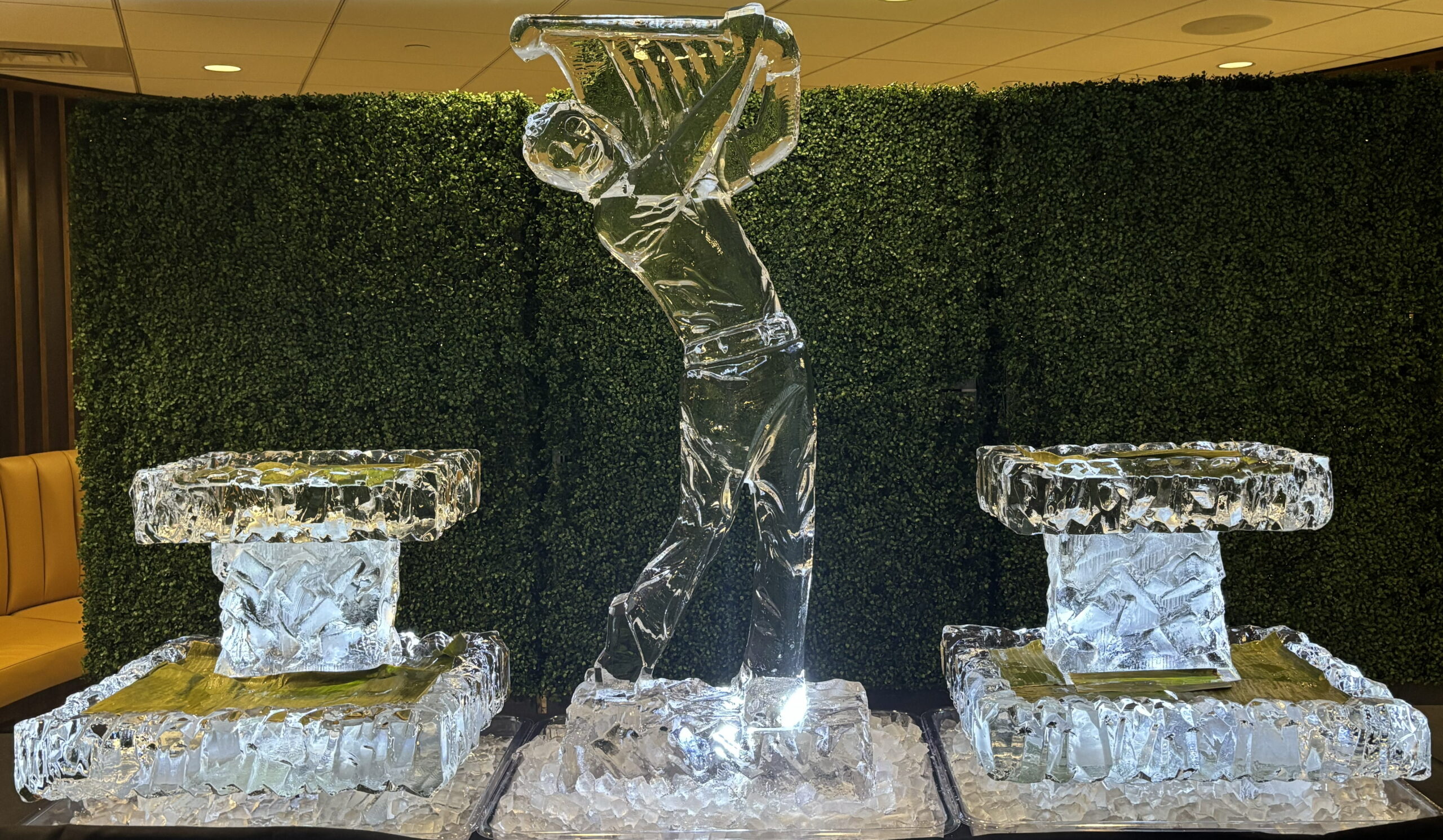 Hand holding torch ice sculpture