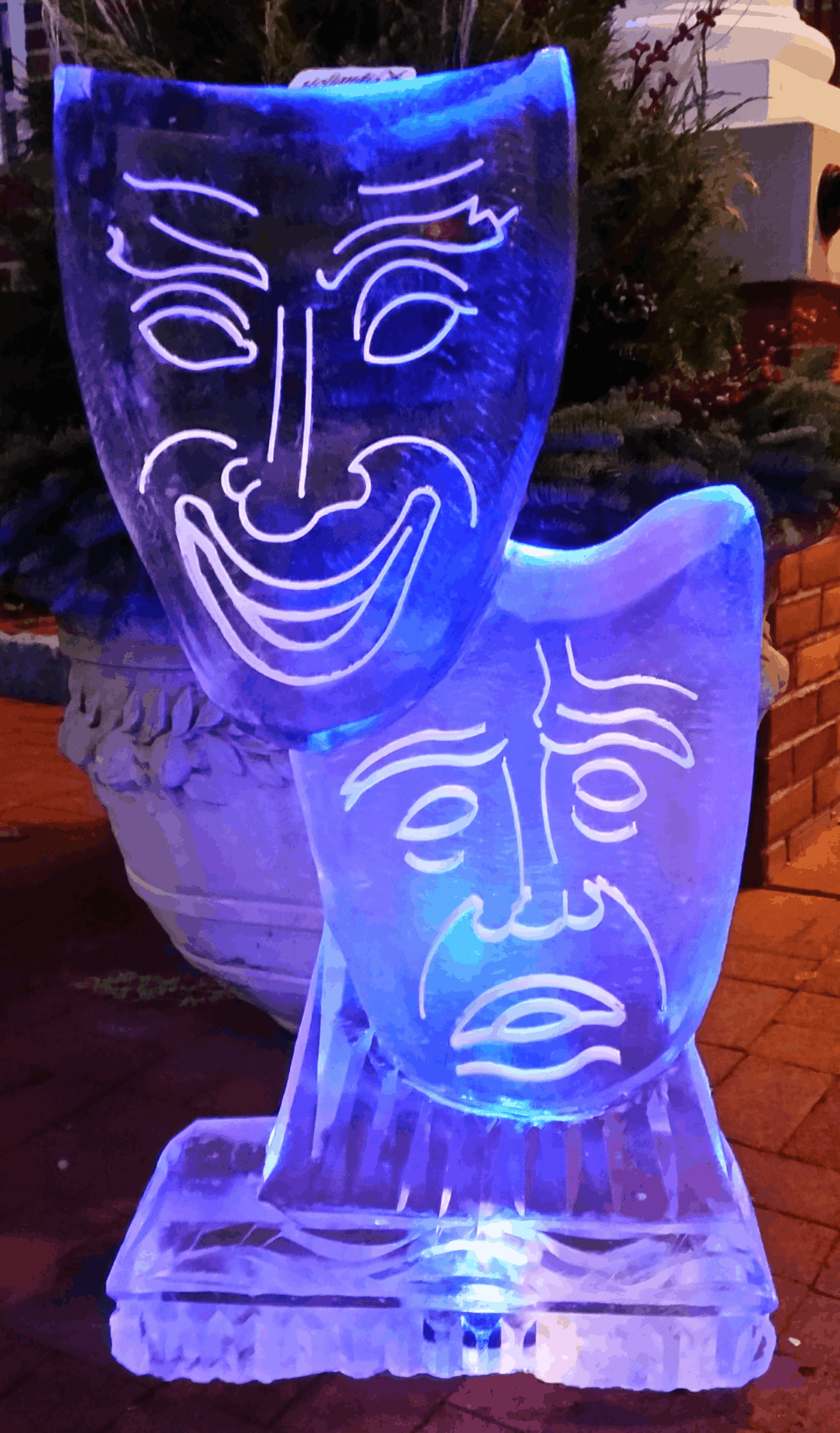 Blue illuminated abstract ice sculpture