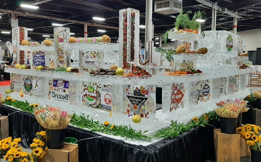 Grand multi tiered seafood buffet ice display at a catered event